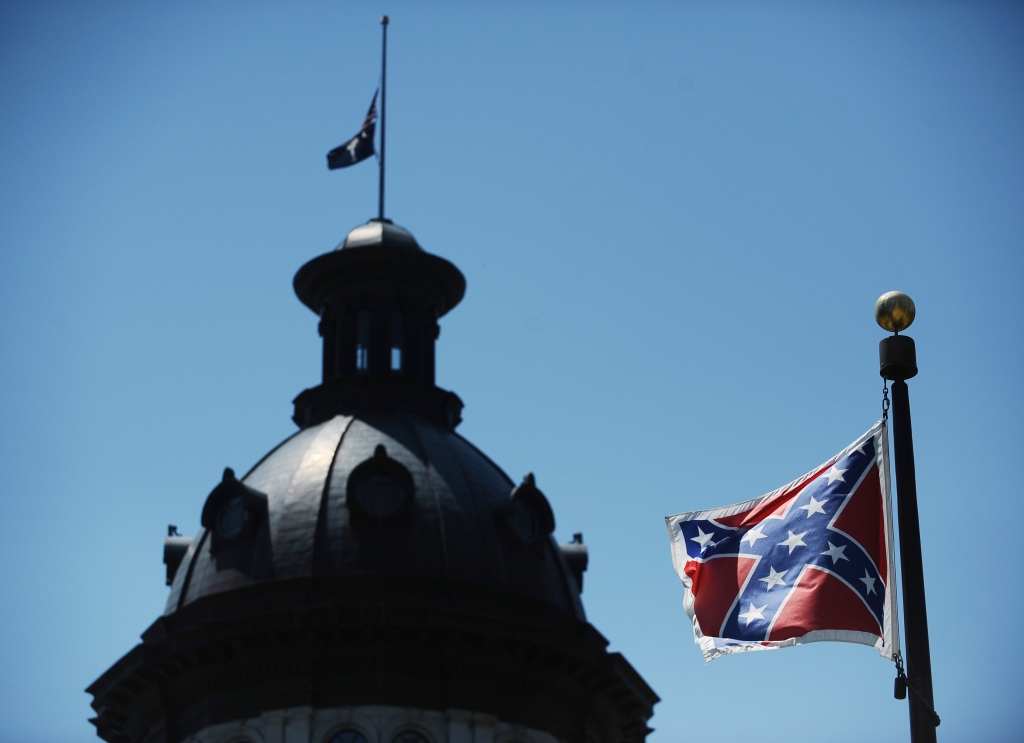 Activist Removes Confederate Flag From Monument | News | BET