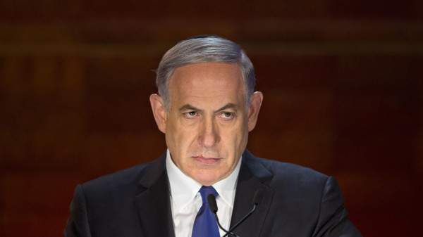 Israeli Prime Minister Benjamin Netanyahu looks on as he speaks at the opening ceremony of the Holocaust Remembrance Day at the Yad Vashem Holocaust Memorial in Jerusalem Wednesday