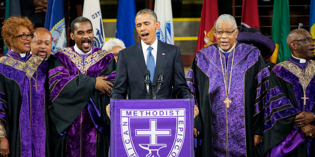 Loading President Barack Obama sings Amazing Grace during services honoring the life of Reverend Clementa Pinckney