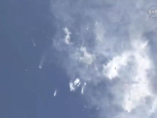 A SpaceX Falcon 9 rocket breaks up over the Atlantic Ocean on Sunday