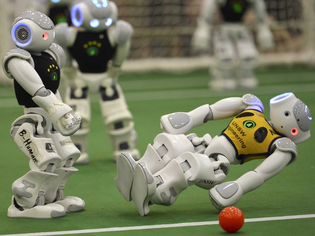 A humanoid robot falls during the 2015 Robocup finals in Hefei Anhui province