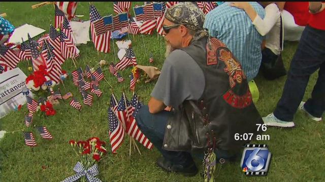 A parking lot has become a makeshift memorial for the victims of the Chattanooga shooting