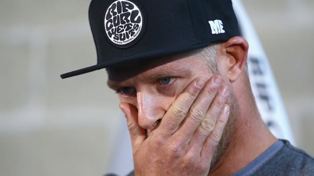 A visibly shaken Mick Fanning spoke to media at Sydney Airport