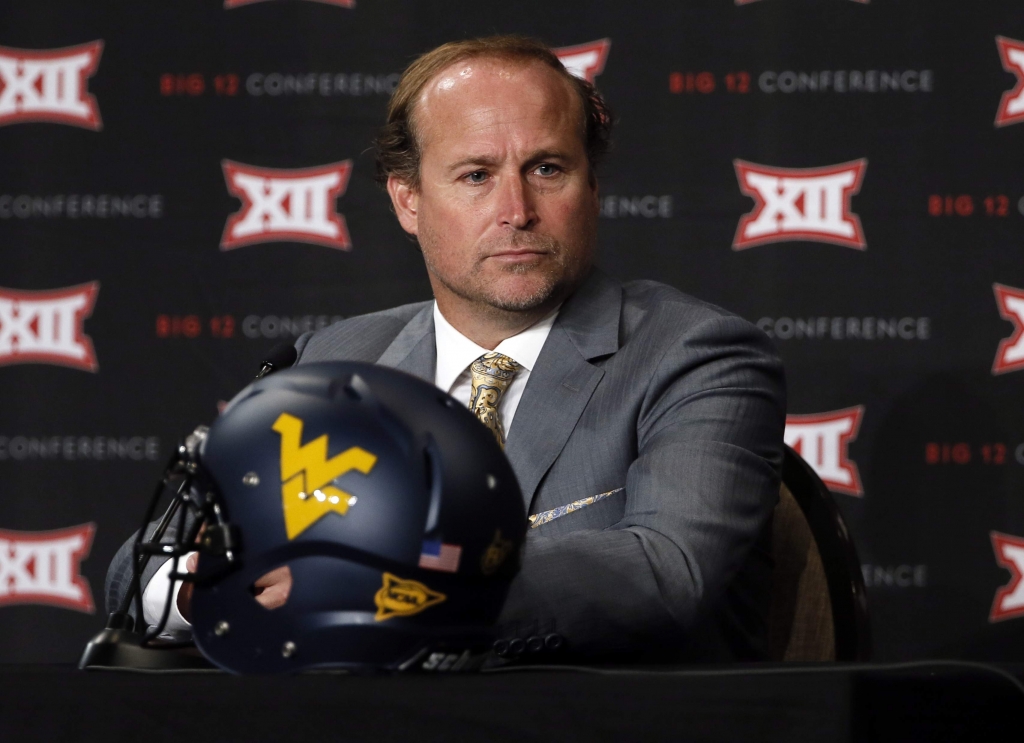 Dana Holgorsen addresses attendees at the Big 12 Media Days