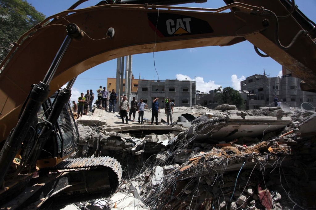 Palestinian homes and buildings destroyed by Israeli airstrikes last year