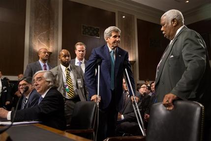 Secretary of State John Kerry center Secretary of Energy Ernest Moniz seated second from left and Secretary of Treasury Jack Lew seated left arrive to testify at a Senate Foreign Relations Committee hearing on Capitol Hill in Washington Thursday