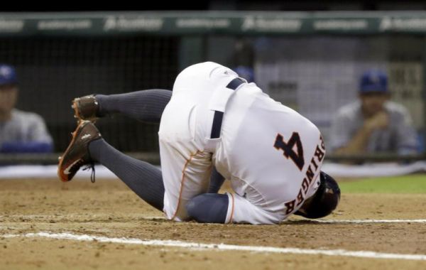 Houston Astros George Springer hits the ground after