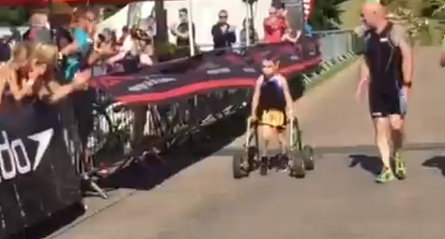 An 8-year-old with cerebral palsy completed a short triathlon in England over the weekend