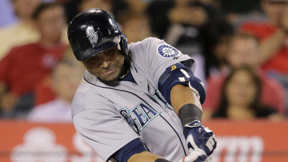 WATCH: Ex-Yankee Robinson Cano hit in head with errant throw into Mariners