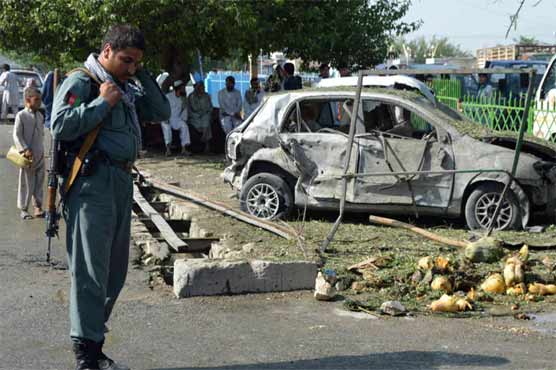 At least 18 civilians were killed in a suicide car bomb attack near a military base in Afghanistan