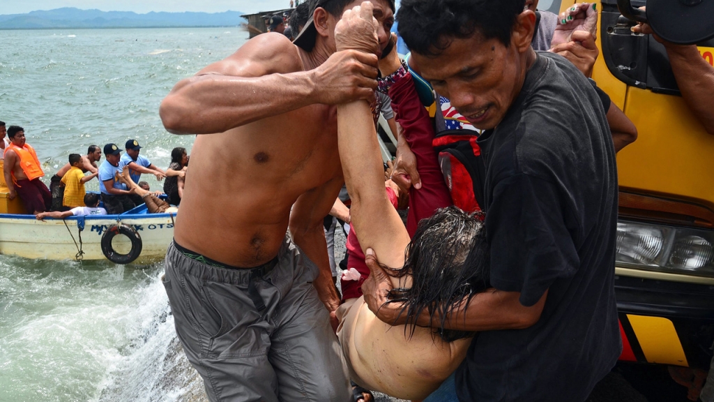 At least 36 people have been killed when a passenger ferry capsized off the central Philippines