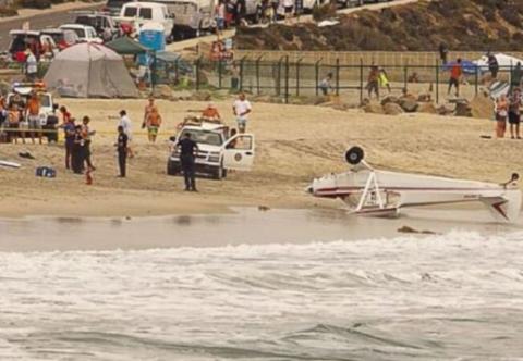 Plane crashes into crowded California beach boy suffers head injury