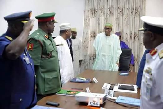 Buhari at a meeting with the Service Chiefs