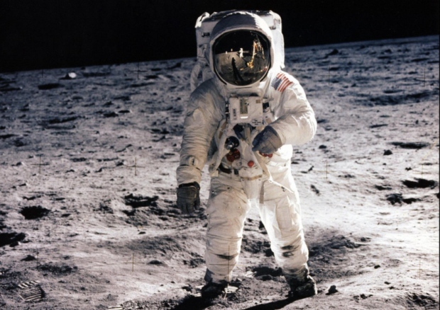 Buzz Aldrin walking on the surface of the moon during the Apollo 11