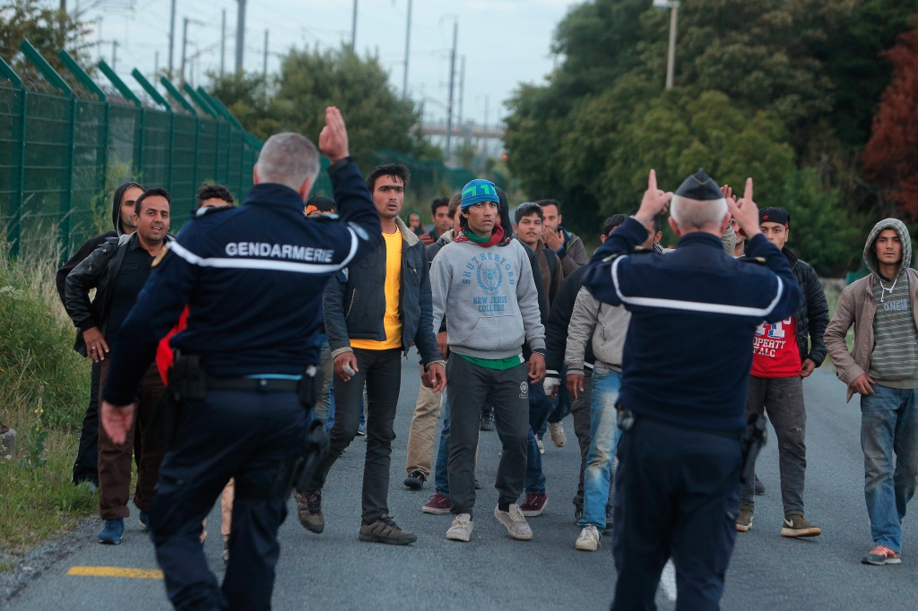 One dead as migrants storm Eurotunnel