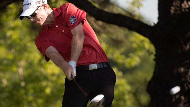 David Hearn from Brantford Ont. hits off the 16th hole tee during second-round play of the Canadian Open at Glen Abbey in Oakville Ont. on Friday. Hearn shot an 8-under 64 Friday to move to within three shots of leader Chad Campbell. Hearn has a chanc