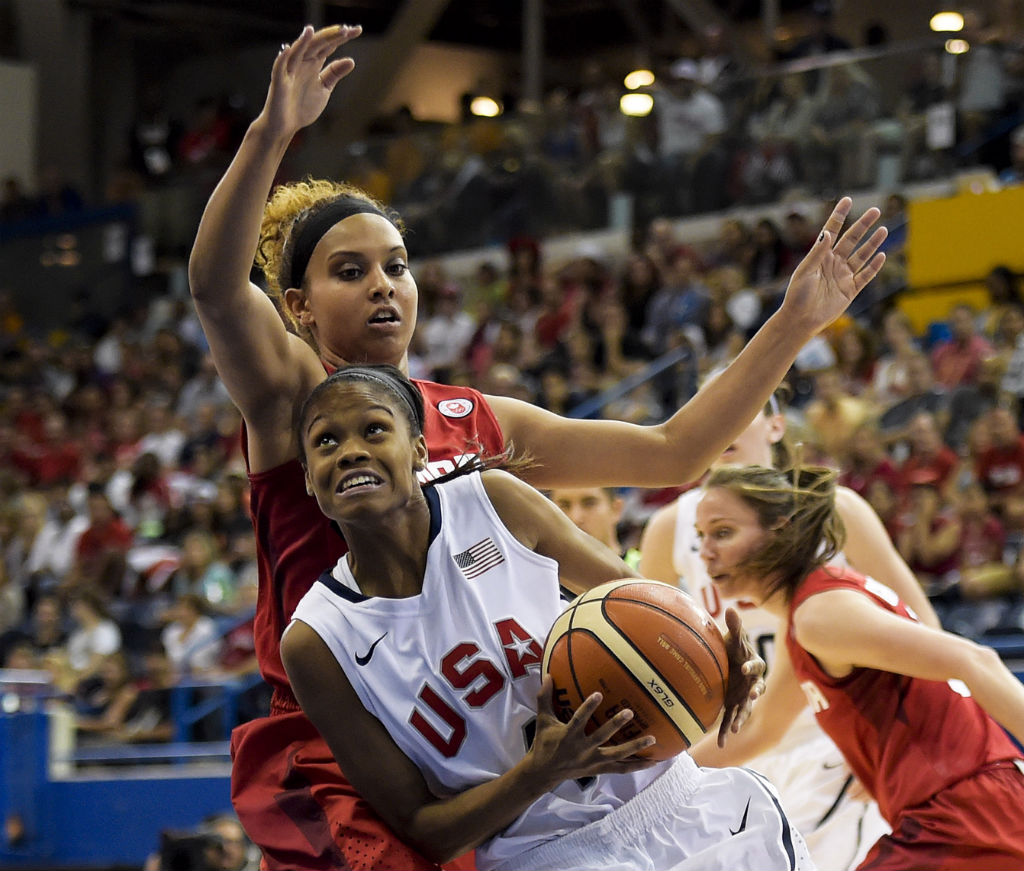 Windsor's Miah Marie Langlois left battles for the ball against United States guard Moriah Jefferson right during first half gold medal action at the Pan American Games in Toronto on Monday