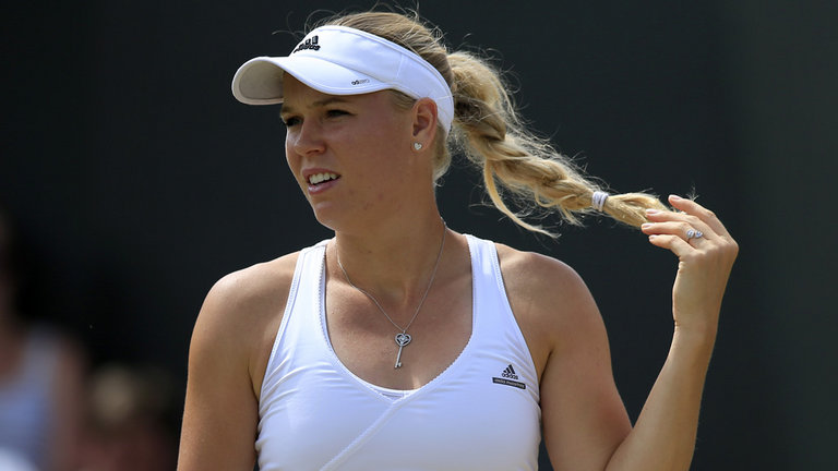 Caroline Wozniacki in action against Garbine Muguruza on Monday