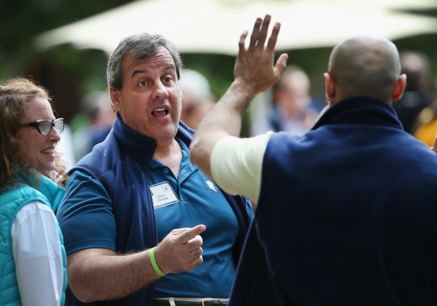 New Jersey Governor Chris Christie chats with Yousef Al Otaiba United Arab Emirates Ambassador to the United States at the Allen & Company Sun Valley Conference