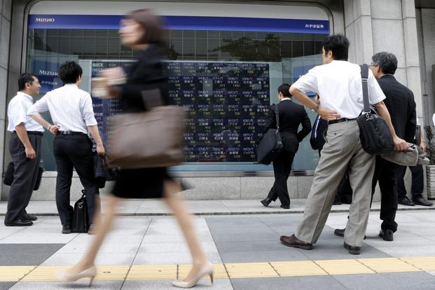 Asian shares edge up euro gains after new Greek proposals