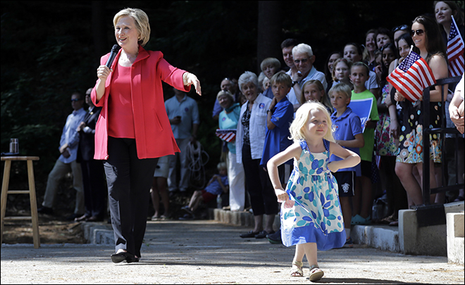 Clinton says she takes a 'backseat to no one&#39 among liberals