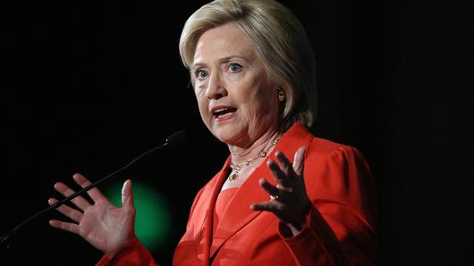 Hillary Clinton speaks to guests at the Iowa Democratic Party's Hall of Fame dinner