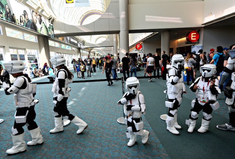 A group of young Star Wars stormtroopers walk inside the Convention Center at the 2015 Comic Con International in San Diego California