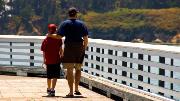 Father and son walking