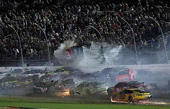 Austin Dillion's car slams into the catch fence at the end of the Coke 400 at Daytona International Speedway