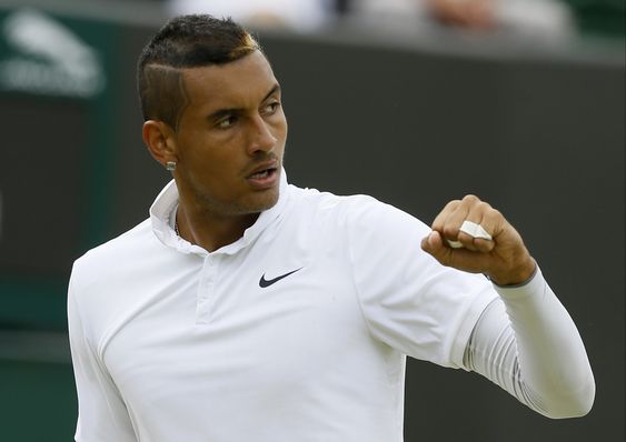 Australia celebrates winning a point against Richard Gasquet of France during their singles match at the All England Lawn Tennis Championships in Wimbledon London Monday