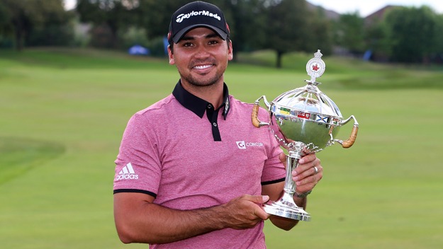 OAKVILLE ON- JULY 26 Jason Day of Australia celebrates with the winner's trophy after the final round of the RBC Canadian Open at Glen Abbey Golf Club