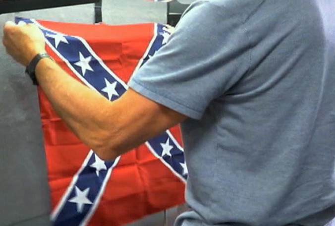 Daytona International Speedway is offering to exchange any fan's Confederate flag with a U.S. flag at the Coke Zero 400 on Sunday