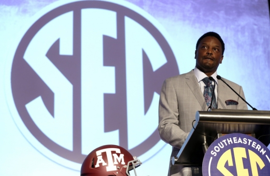 Texas A&M coach Kevin Sumlin speaks to the media at the Southeastern Conference NCAA college football media days Tuesday