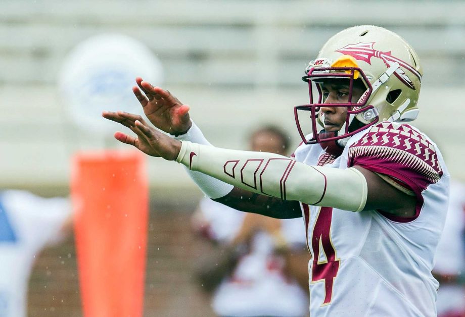 2015 shows Florida State quarterback De'Andre Johnson calling a play in the first half of Florida State Garnet & Gold spring college football game in Tallahassee Fla. Florida State has dismissed Johnson from the team