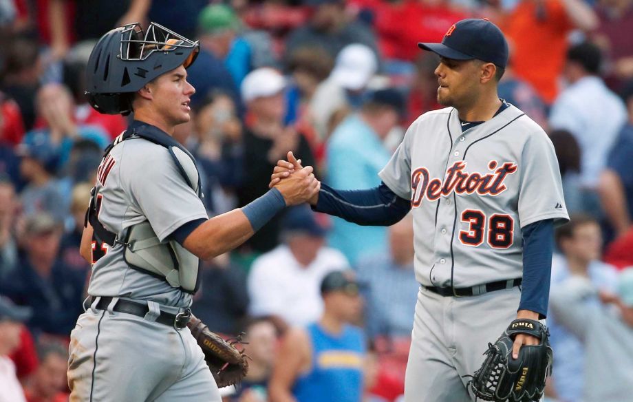 Detroit Tigers James McCann left and Joakim Soria celebrate after the Tigers defeated the Boston Red Sox 5-1 in a baseball game in Boston Saturday