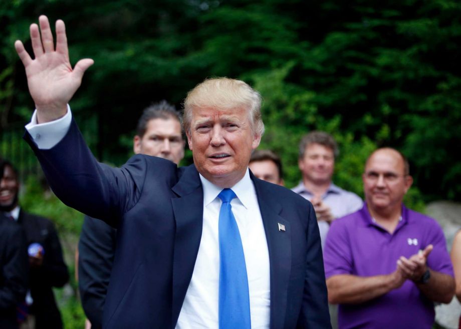 Republican presidential candidate Donald Trump waves as he arrives at a house party in Bedford N.H. Alex Nogales president of the National Hispanic Media Coalition said Thursday