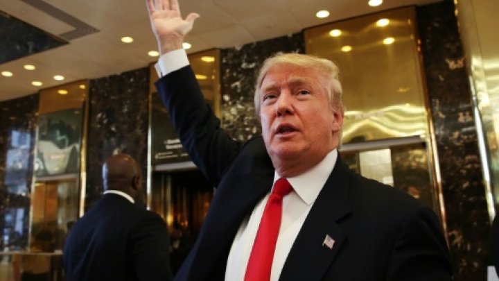 Donald Trump greets supporters and tourists at the Trump Tower