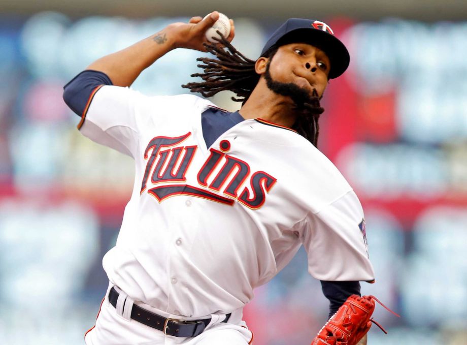 Minnesota Twins pitcher Ervin Santana throws against the Detroit Tigers in the first inning of a baseball game Friday