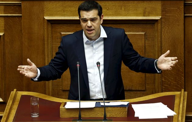 Greek PM Tsipras delivers a speech during a parliamentary session in Athens