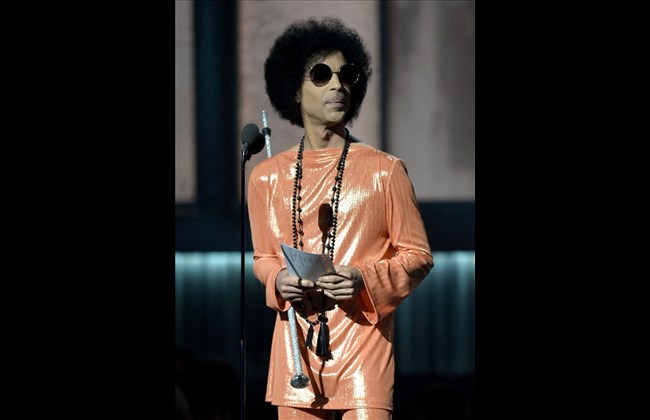 Prince presents an award at the 57th Annual Grammy Awards in Los Angeles in this