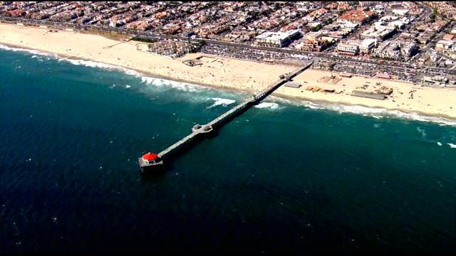 INT: Aggressive' shark bumps surfer in Huntington Beach