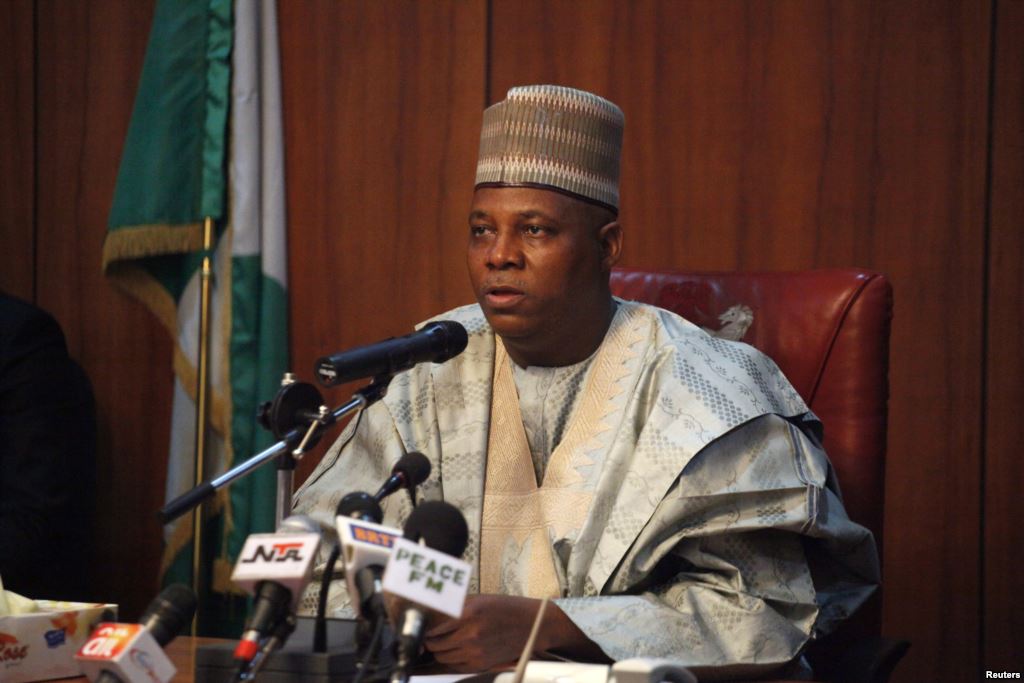 FILE- Borno state Governor Kashim Shettima on Saturday commended security and vigilante forces saying that the death toll in a Boko Haram raid on the village of Zabarmari would have been much higher had it not been for their