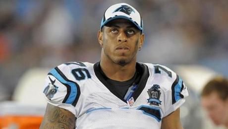 Carolina Panthers defensive end Greg Hardy looks on from the sideline during a preseason NFL football game Friday Aug. 8 2014 in Charlotte N.C