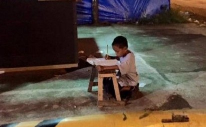 After A Photo Of A Homeless Boy Studying Outside A McDonalds Went Viral, His