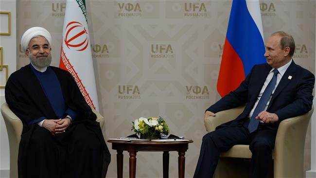 Russia’s President Vladimir Putin meets with his Iranian counterpart Hassan Rouhani on the sidelines of the 7th BRICS summit in Ufa