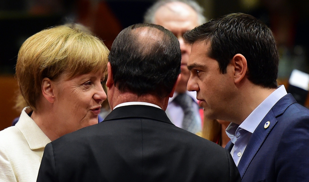 German Chancellor Angela Merkel French President Francois Hollande and Greek Prime Minister Alexis Tsipras confer