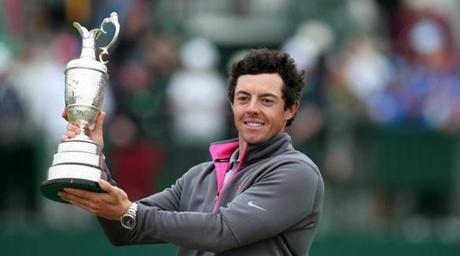 Northern Ireland's Rory Mc Ilroy holds up the Claret Jug after winning the 2014 British Open Golf Championship at Royal Liverpool Golf Course in Hoylake north west England