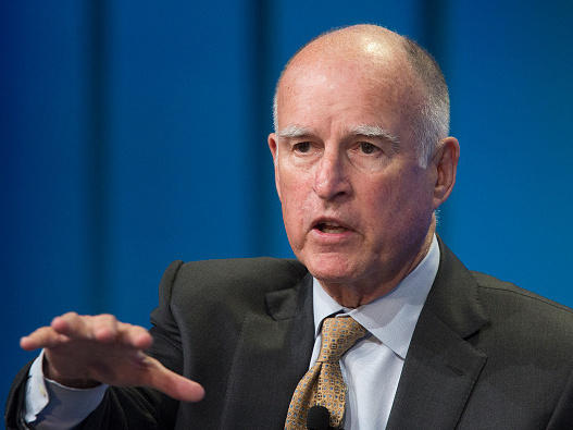 Gov. Jerry Brown of California signed a controversial vaccination bill into law on Tuesday