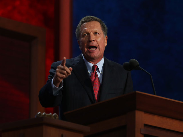 Republican U.S. presidential candidate and Ohio Governor John Kasich arrives on stage to formally announce his campaign for the 2016 Republican presidential nomination during a kickoff rally in Columbus Ohio