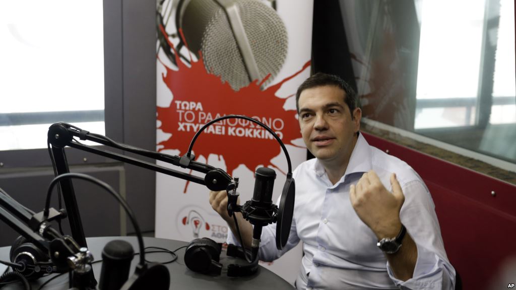 Greece's Prime Minister Alexis Tsipras gives an interview to the radio station''Sto Kokkino 1055' in Athens